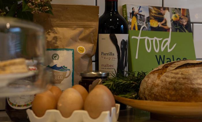 free range eggs, home bake cake and jam, local coffee, milk etc to welcome you to Pembrokeshire